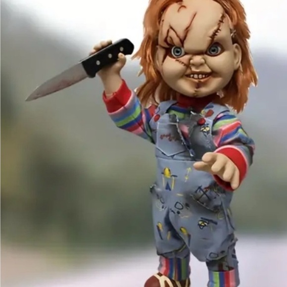 Will trade for Chucky collectors items, my 9 year old has 2 curio cabinets - Picture 12 of 12